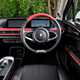 GWM Ora 03 review, interior, black, red, dashboard, steering wheel | Parkers