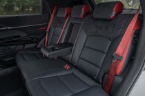 KGM Actyon (2025): rear seats, black and red faux leather upholstery