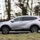 Honda CR-V (2023) review: side view driving shot, silver paint