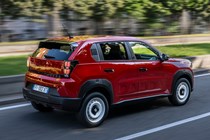 Fiat Panda (2025) review: rear three quarter driving, red paint