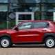 Fiat Panda (2025) review: side view driving, red paint