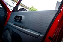 Fiat Panda (2025) review: Fiat-brand door cards, blue and black upholstery