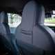 Fiat Panda (2025) review: phone holders on front seats, blue and black upholstery