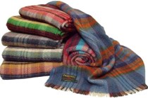 Image of a pile of Tweedmill rugs