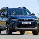 Dacia Bigster (2025) review: front three quarter driving, blue paint