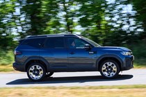 Dacia Bigster (2025) review: side view driving, blue paint