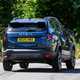 Dacia Bigster (2025) review: rear three quarter driving, blue paint
