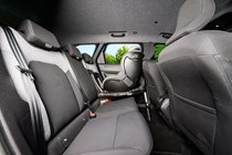 Dacia Bigster (2025) review: rear seat with child seat, black and grey upholstery