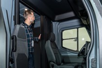 You can walk from the cabin to the rear of the Estafette.
