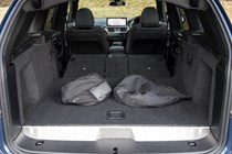 BMW X3 review (2023): boot space, seats down, showing inconvenient charging cable bags for PHEV model