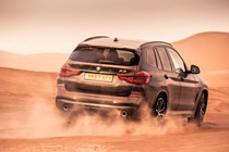 BMW X3 off-roading in the sand