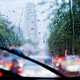 Image through the windscreen of a car driving in heavy rain