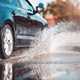 Image of a Volkswagen Jetta driving through a deep puddle