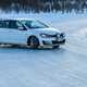 Image of a Volkswagen Golf sliding around a snowy corner