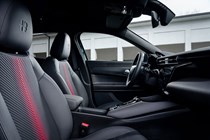 Alfa Romeo Junior Ibrida (2025) review: front seats, black upholstery