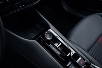 Alfa Romeo Junior Ibrida (2025) review: centre console, black upholstery