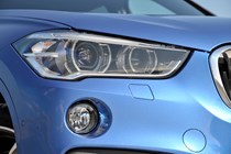 BMW X1 SUV (2015-) in blue front headlight