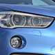 BMW X1 SUV (2015-) in blue front headlight