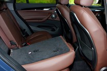 BMW 2016 X1 SUV Interior detail - lowered rear seat
