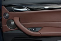 BMW 2016 X1 SUV Interior detail - speakers in door panel