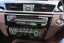 BMW 2016 X1 SUV Interior detail - CD and climate control