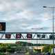 Image of a UK motorway overhead gantry showing a 50mph speed limit