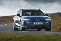 Audi A6 Avant review - front, blue, driving round corner