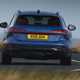 Audi A6 Avant review - rear, blue, driving round corner