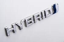 White 2019 Toyota Yaris Hybrid badge