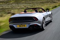 Aston Martin Vanquish Volante review - rear, silver, driving