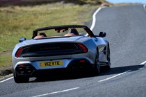 Aston Martin Vanquish Volante review - rear, silver, driving