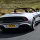 Aston Martin Vanquish Volante review - rear, silver, driving