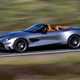 Aston Martin Vanquish Volante review - front side, silver, driving fast