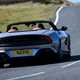 Aston Martin Vanquish Volante review - rear, silver, driving