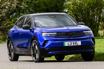 Vauxhall Mokka Electric review, driving, blue, front three quarters | Parkers