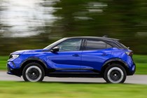 Vauxhall Mokka Electric review, driving, blue, side | Parkers