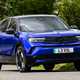 Vauxhall Mokka Electric review, driving, blue, front three quarters | Parkers