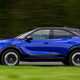 Vauxhall Mokka Electric review, driving, blue, side | Parkers