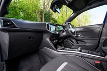 Vauxhall Mokka Electric review, interior, black, dashboard, steering wheel, seats | Parkers
