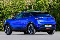 Vauxhall Mokka Electric review, static, blue, rear three quarters | Parkers