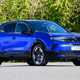 Vauxhall Mokka Electric review, static, blue, front three quarters | Parkers