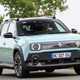 Renault 4 E-Tech review, blue, moving, front three quarters | Parkers