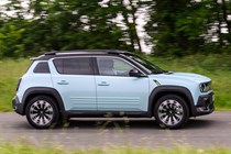Renault 4 E-Tech review, moving, blue, side | Parkers