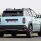Renault 4 E-Tech review, moving, blue, rear three quarters | Parkers