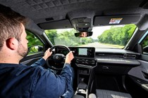 Renault 4 E-Tech review, interior, Ted Welford driving | Parkers
