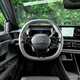 Renault 4 E-Tech review, interior, grey and black steering wheel | Parkers