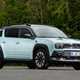 Renault 4 E-Tech review, blue, static, front three quarters | Parkers