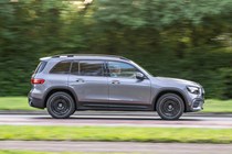 Mercedes GLB (2023) review: side view driving, silver paint, British B-road