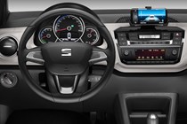 SEAT Mii Electric review - driver's view, showing steering wheel, dials and smartphone dock, 2019