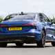 Audi A6 saloon (2025) review: rear three quarter cornering, blue paint